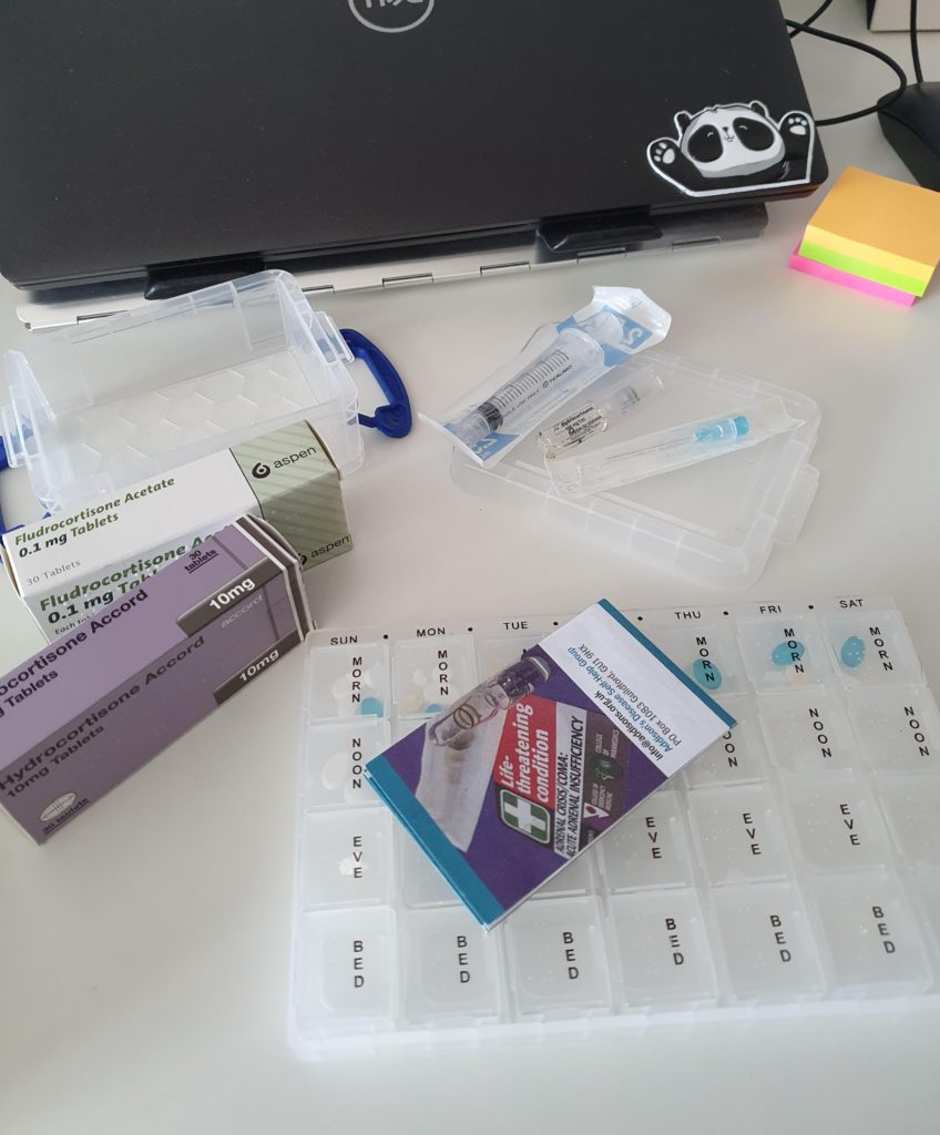Medication and emergency kit on desk